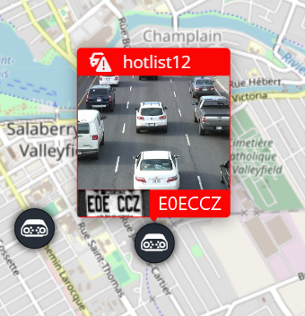 A pop-up window associated with an ALPR unit in the Maps task of the Genetec Web App, displaying a hotlist hit.